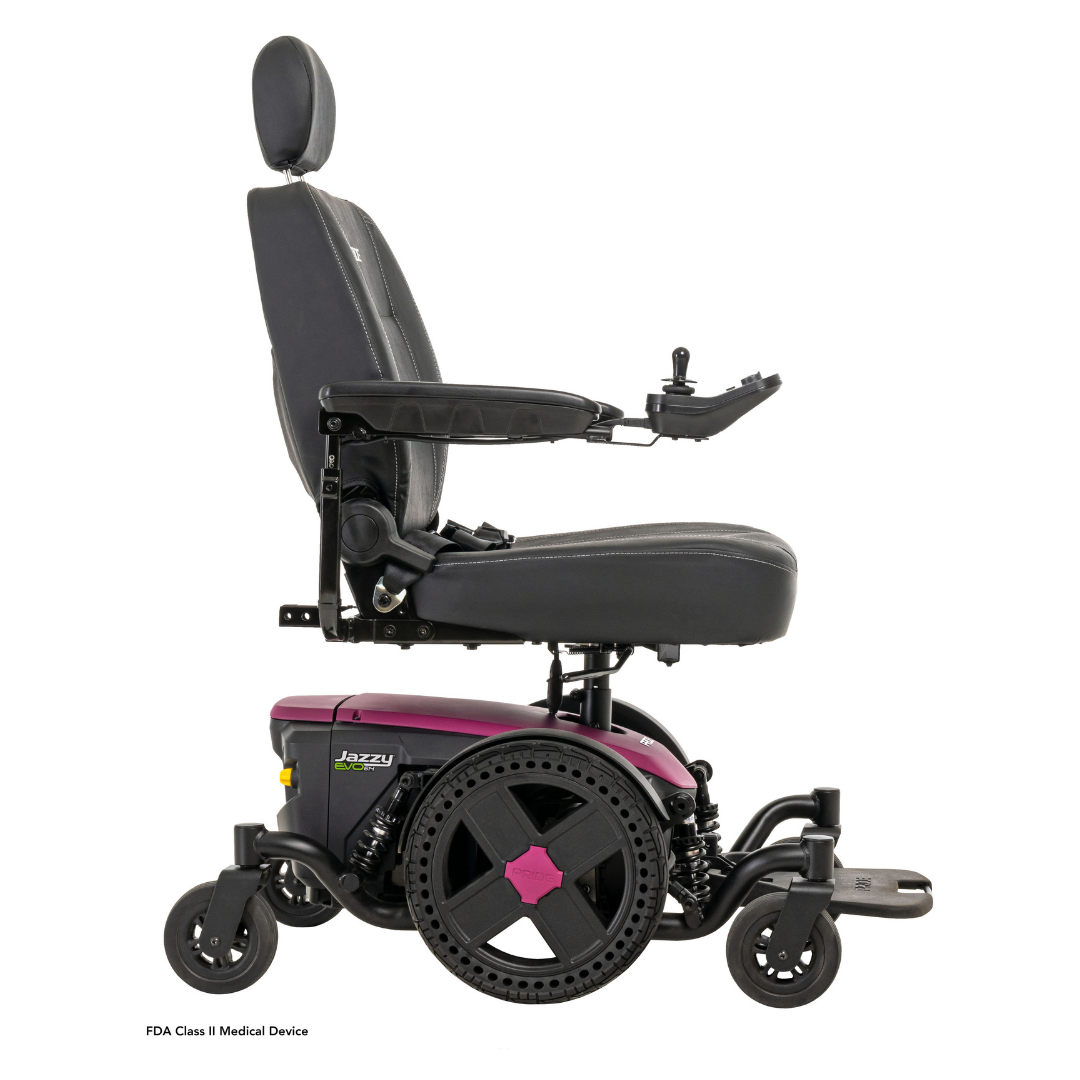 A side view of the Pride Mobility Jazzy® EVO 614 HD Bariatric Powerchair with ATX Suspension shows a black cushioned seat, headrest, armrests, dark pink base with four wheels, and a right-arm joystick control.