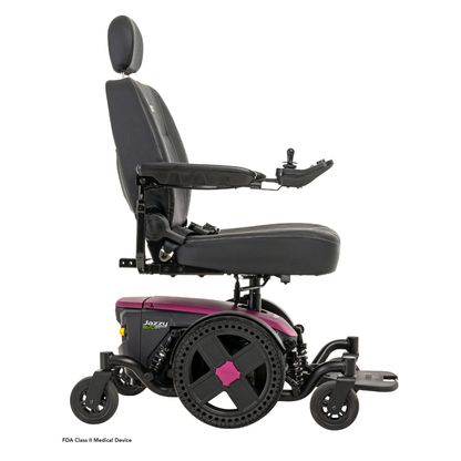 A side view of the Pride Mobility Jazzy® EVO 614 HD Bariatric Powerchair with ATX Suspension shows a black cushioned seat, headrest, armrests, dark pink base with four wheels, and a right-arm joystick control.