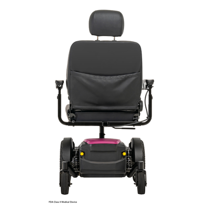 Rear view of a black Pride Mobility Jazzy® EVO 614 HD Bariatric Powerchair with ATX Suspension, featuring padded headrest, armrests, large wheels, and a compact design with a small pink accent near the base.