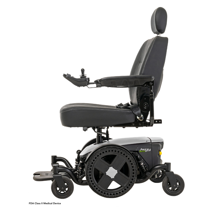 A side profile of the black Pride Mobility Jazzy® EVO 614 HD Bariatric Powerchair with ATX Suspension is shown, featuring large rear wheels, padded seat and backrest, headrest, armrests, joystick controller, and footrest on a white background.