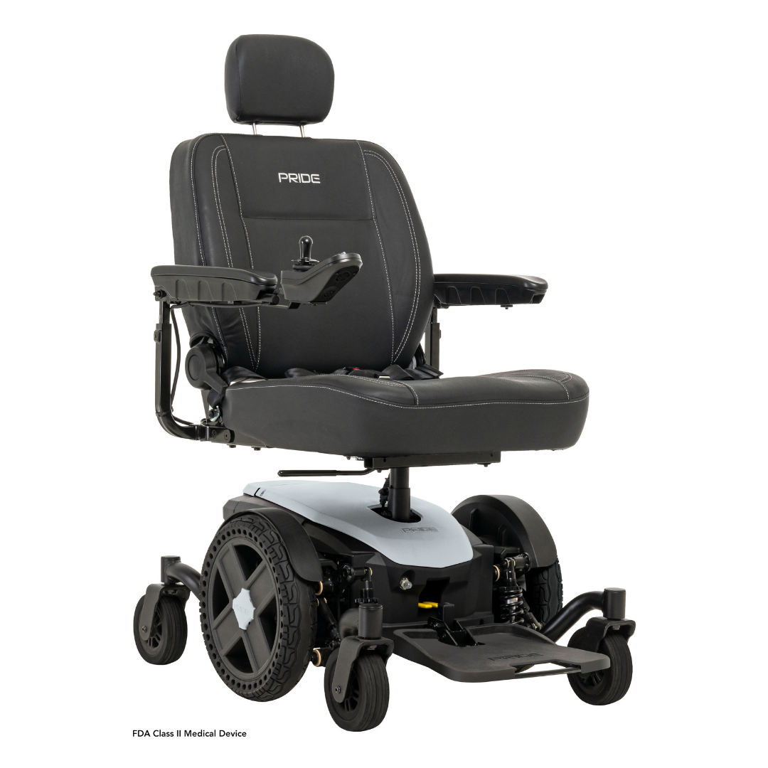 A black Pride Mobility Jazzy® EVO 614 HD Bariatric Powerchair with ATX Suspension features padded seat, armrests, headrest with Pride branding, joystick control, and large rear wheels.