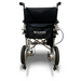 Rear view of the Journey Air Lightweight Folding Powerchair, just 37 lbs, in sleek black fabric with Journey Health & Lifestyle logo. Features small rear wheels and motor components for effortless transport and mobility aid.