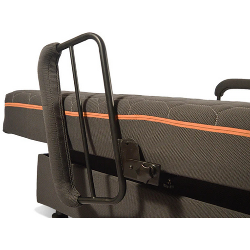 A close-up of a black metal safety rail on the Journey UPbed® Standard 4-in-1 Motorized Lift Beds gray frame, featuring an orange accent stripe. The rail, designed for support and safety, is upright next to the plush memory foam mattress.