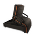 A black and orange reclining chair with a quilted pattern and sturdy armrests, partially unfolded to reveal a hidden compartment beneath, designed for comfort like the Journey UPbed® Standard 4-in-1 Motorized Lift Bed, blending coziness with functionality.