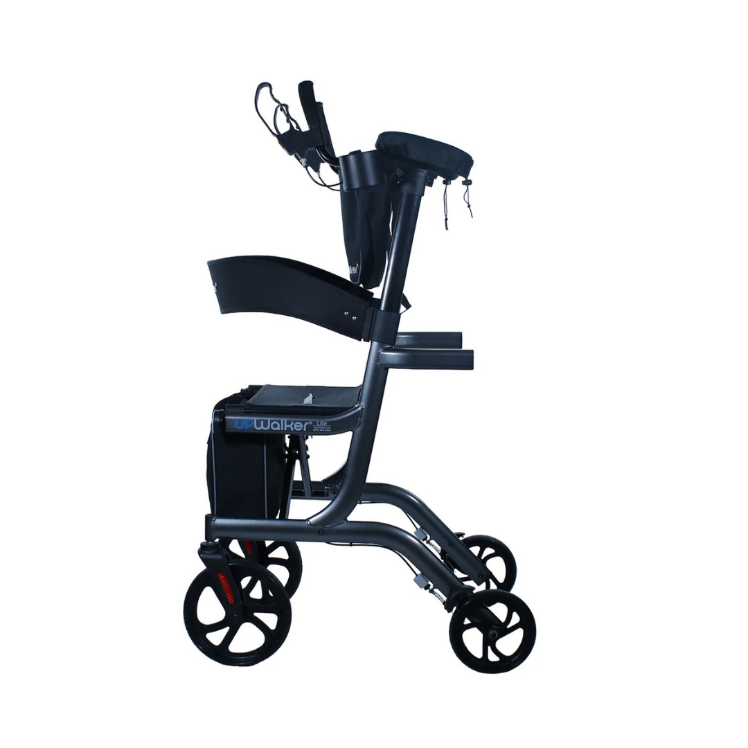 Side view of the Journey UPWalker Premium Lite Upright Rolling Walker in Dark Silver, a modern mobility walker with seat, backrest, armrests, four wheels, hand brakes, enhanced comfort, and convenient smart storage solutions.