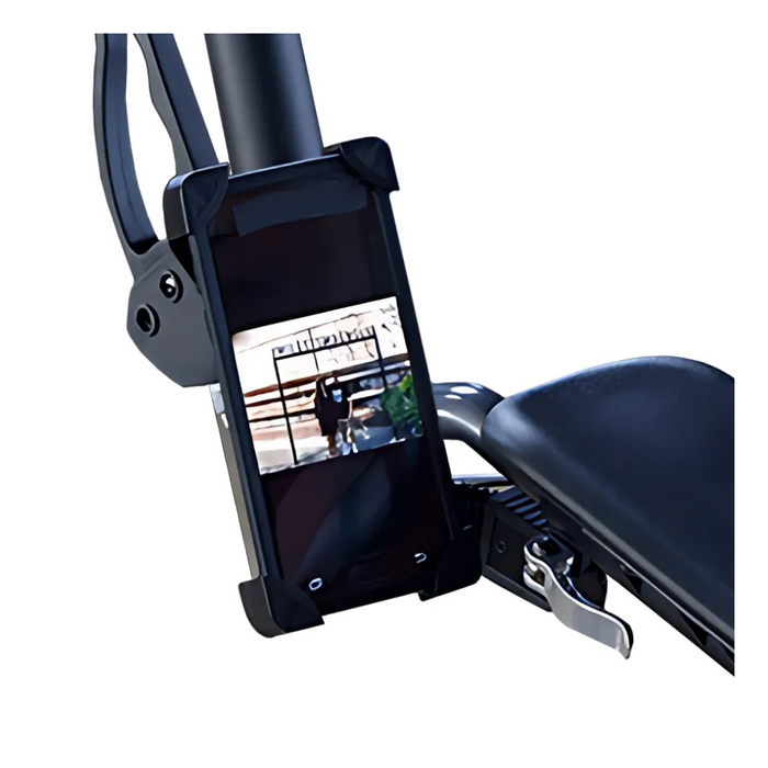 A close-up of the Journey UPWalker Parts & Accessories shows a smartphone secured to the handlebar like an essential beverage holder. The phone displays a fitness video with outdoor exercise, and the right side reveals part of the bike seat, illustrating its snug attachment.