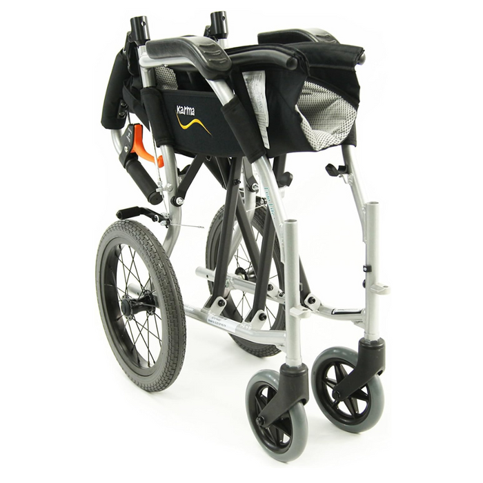 The Karman Ergo Flight Ultra Lightweight Ergonomic Transport Chair features large rear wheels, smaller front wheels, a silver metal frame, and ergonomic handles. Its black seat includes a mesh section for added comfort.