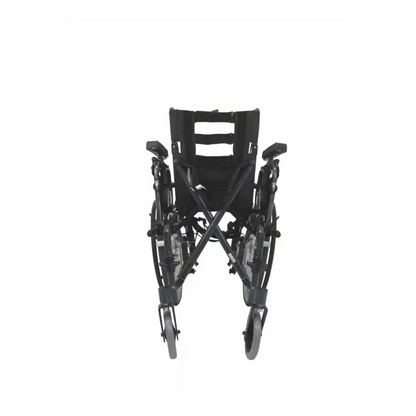 A folded Karman Aluminum Ultra Lightweight MVP-502 Reclining Wheelchair in black, shown from the front with its compact, collapsible frame and wheels against a white background.