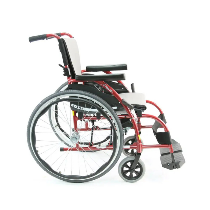 The Karman S-Ergo 105 Wheelchair showcases bold red and black colors, cushioned seating, ergonomic design, and fixed footrests. With large rear wheels, smaller front casters, this lightweight manual wheelchair is pictured from the side on a white background.