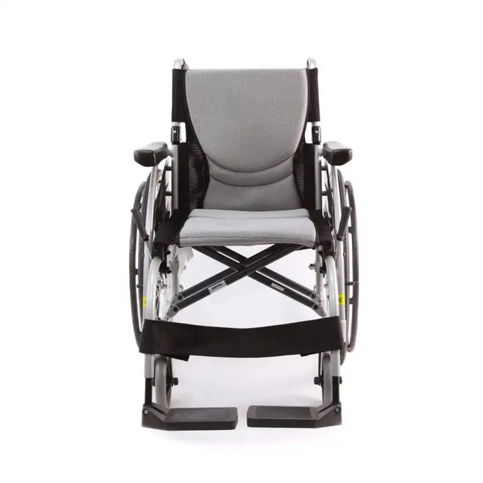 The Karman S-Ergo 105 Wheelchair with Fixed Footrest & Ergonomic Seat is depicted front-facing on a white background. It boasts a metallic frame, cushioned armrests and footrests, large rear wheels, and smaller front wheels, offering lightweight comfort and mobility.