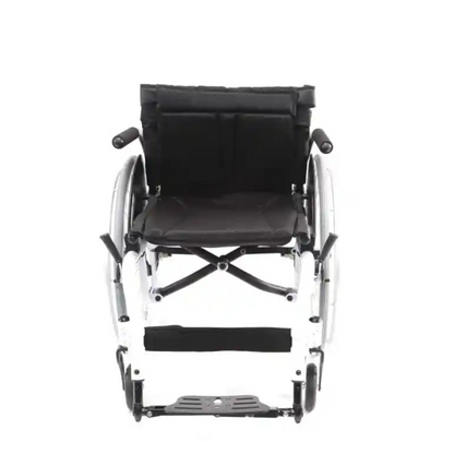 A front view of the foldable Karman S-Ergo ATX Active Wheelchair, in silver and black against a white background, showcases its ergonomic design with a black fabric backrest and seat. Visible armrests and footrests highlight the ultralite models impressive strength-to-weight ratio at just 26 lbs.