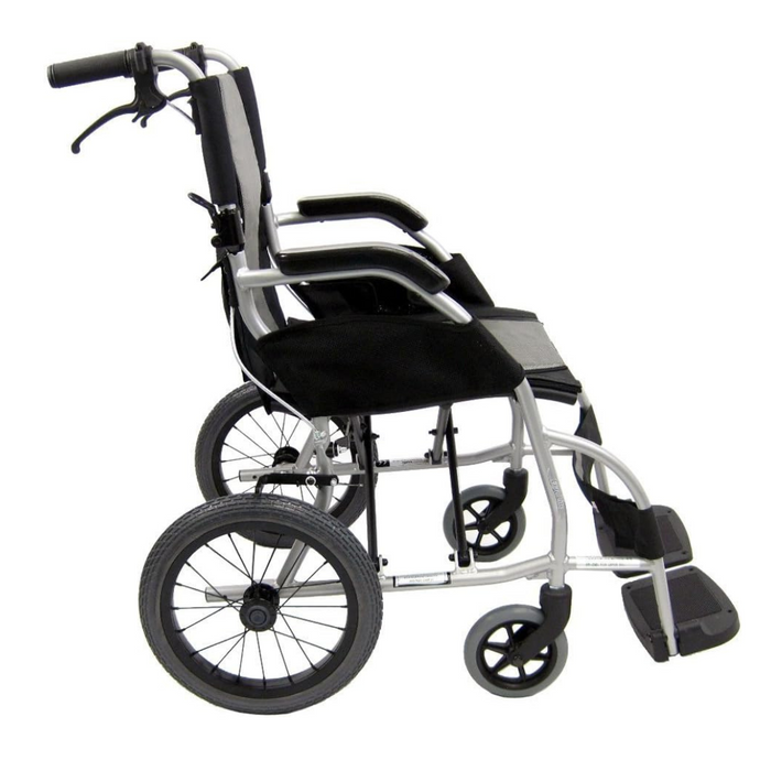 Side view of the Karman Ergo Lite Ultra Lightweight Ergonomic Transport Chair, weighing only 18 lbs, with a silver frame, black seat, and armrests. It features large rear wheels and smaller front ones for easy transport and maneuverability.
