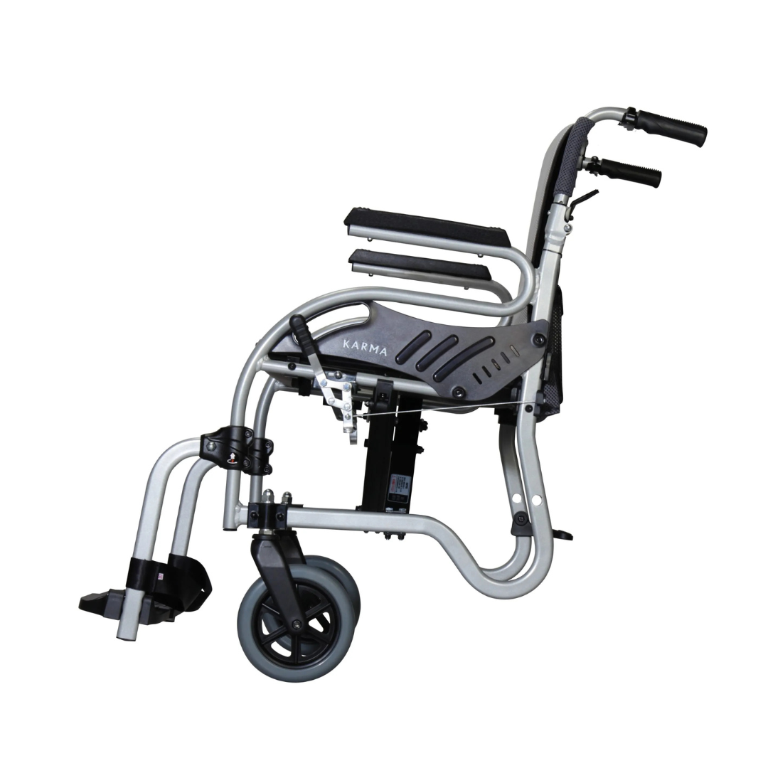 A side view of the Karman Healthcare STAR 2 Lightweight Folding Wheelchair with a black seat, armrests, footrests, a silver frame, and large rear wheels for better mobility.
