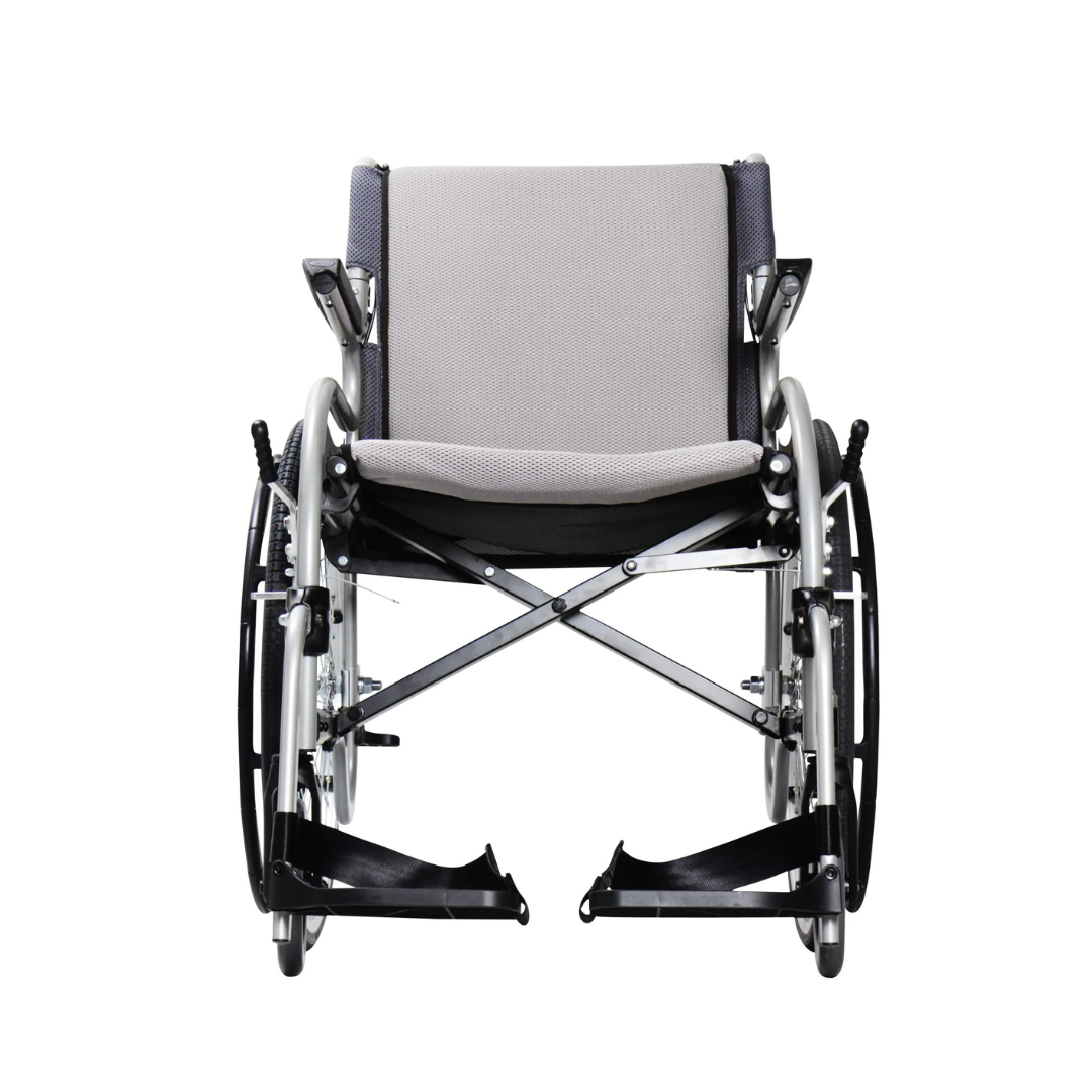 A front view of the Karman Healthcare STAR 2 Lightweight Folding Wheelchair in light gray with black armrests and footrests, shown empty and isolated on a white background.
