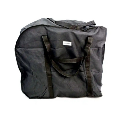The Karman Travel Bag for Ergo Lite & Ergo Flight Wheelchairs is a large black water-resistant bag with two handles and a small white karma label on the front, shown against a plain white background.