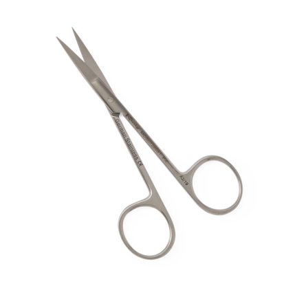 A pair of König Knapp Iris Scissors - Sharp/Sharp, small and stainless steel with curved blades and two finger rings, are positioned diagonally on a white background.