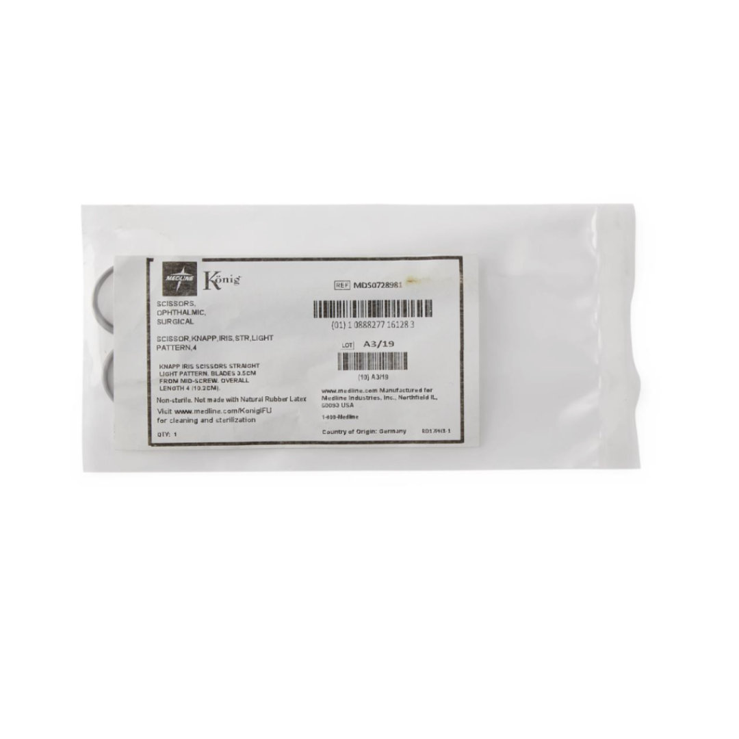 A sealed medical pouch labeled "König Knapp Iris Scissors - Sharp/Sharp" contains stainless steel surgical scissors, with product details, instructions, and manufacturer info visible on the packaging. The pouch is shown on a plain white background.