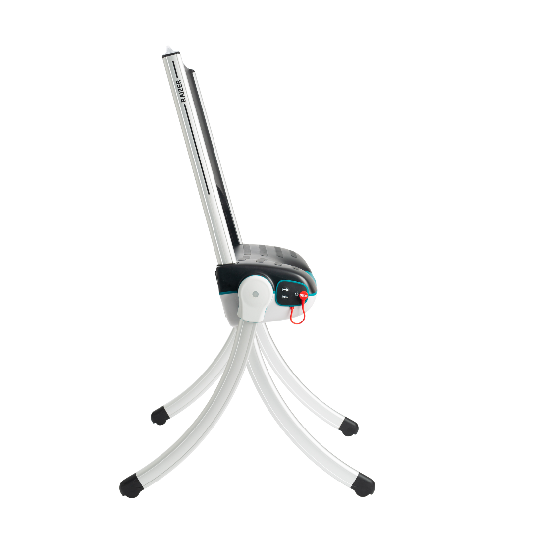 The LiftUp Raizer II is a modern, compact machine with a black seat, silver frame, four curved legs, and a red handle—shown from the side on a white background. Warranty details are included in the product brochure.