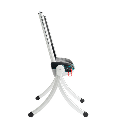 The LiftUp Raizer II is a modern, compact machine with a black seat, silver frame, four curved legs, and a red handle—shown from the side on a white background. Warranty details are included in the product brochure.