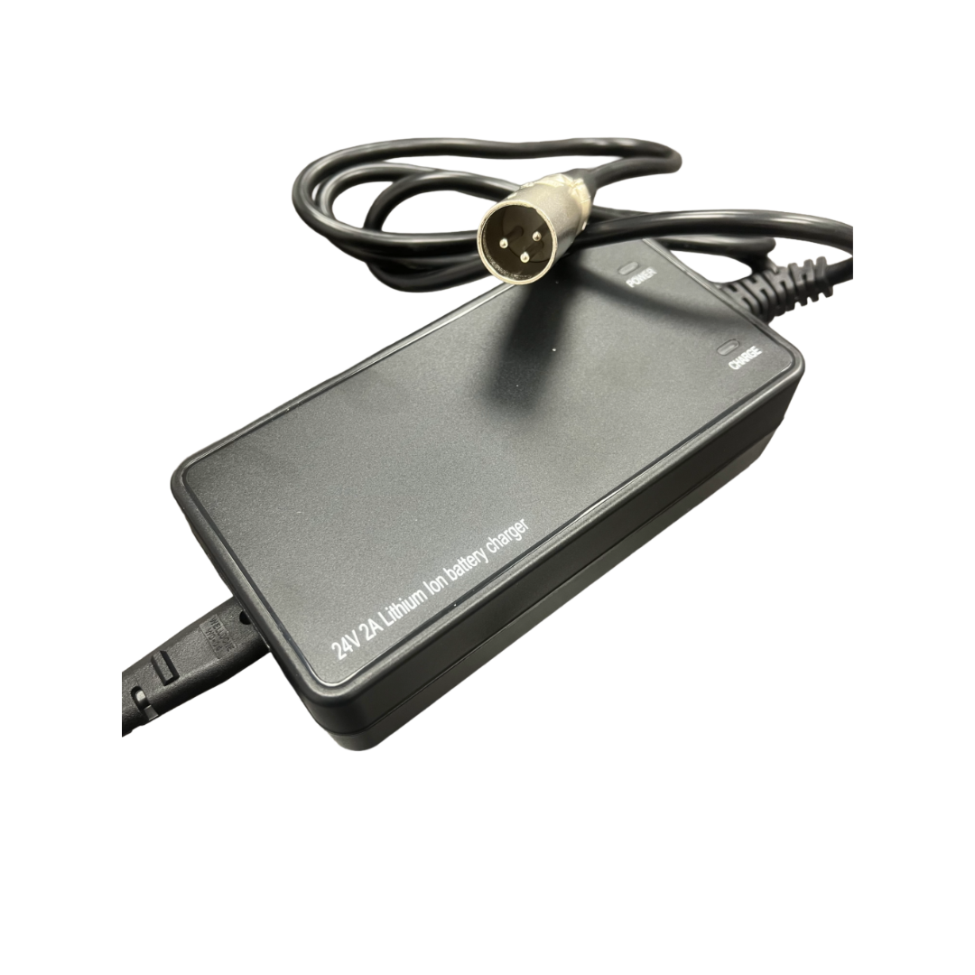 A Lithium Battery Charger 2AH - Monarch Mobility, black in color and suitable for use with Genie Ultralight or Monarch Mobility powerchairs, featuring a 24V/2A output, a power cord, and a three-pin round connector, is displayed on a white background.