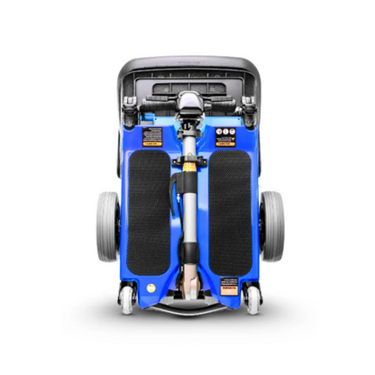 The FreeRider Luggie Elite Travel Scooter, shown folded compactly from above with handles, wheels, and footrests visible on a white background, is an airline-approved mobility scooter ideal for convenient travel.