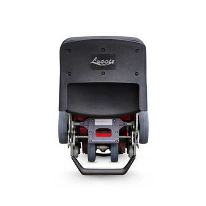 A stair-climbing wheelchair attachment shown from the back, featuring a black seat labeled FreeRider Luggie Standard Travel Scooter, sturdy metal handle at the base, and design inspired by portable mobility scooter technology.