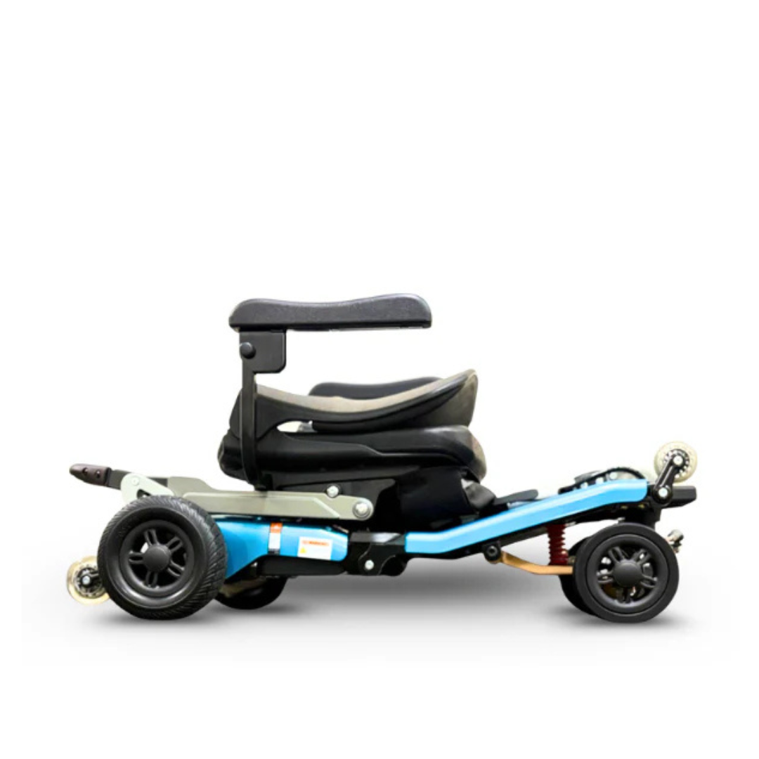 A side view of the FreeRider Luggie Super Plus 4 Travel Scooter—a compact, three-wheeled mobility scooter with a cushioned seat, armrests, and handlebars in black with blue and silver accents, designed for personal transportation.