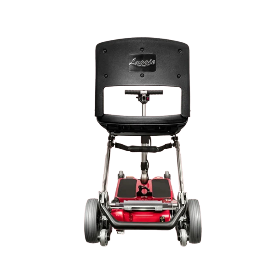 The FreeRider Luggie Classic II Travel Scooter is a compact, airline-approved scooter with a foldable design, black seat and backrest, red base, and four wheels, shown from the rear on a white background.