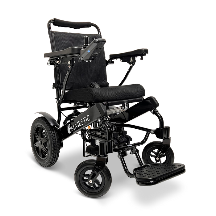 The ComfyGo MAJESTIC IQ-9000 Remote Controlled Electric Wheelchair is a black model equipped with a padded seat and backrest, and it features a digital joystick controller on the armrest. It boasts brushless silent motors for smooth operation, large rear wheels, smaller front wheels, and includes a foldable footrest.