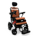 Meet the ComfyGo MAJESTIC IQ-9000 Auto Folding Electric Wheelchair, featuring silent brushless motors for a whisper-quiet ride. It includes a quilted brown seat, black armrests, and frame. The digital joystick controller ensures smooth navigation on large rear wheels with a comfy footrest.