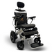 The ComfyGo MAJESTIC IQ-9000 Auto Folding Electric Wheelchair, in black and gold, has brushless silent motors, a quilted cushioned seat and backrest, headrest, armrests, footplate, digital joystick controller for maneuvering, four wheels with smaller front ones for easy navigation.