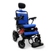 The ComfyGo MAJESTIC IQ-9000 Auto Folding Electric Wheelchair features a lightweight aluminum frame in vibrant red with blue quilted cushions, headrest, armrests, and a right-arm digital joystick. Its design includes four wheels, with two larger rear ones for added stability.