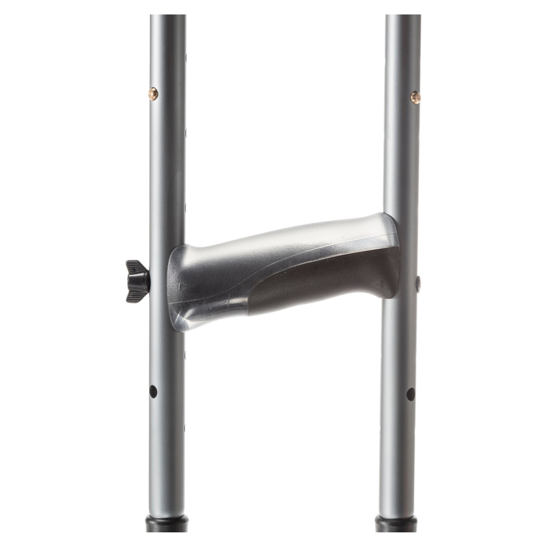 Close-up of a gray handle on the Drive Air-Crutches with Airgonomic™ Underarm Cushions, attached between two metal poles with an adjustment knob. These ergonomic mobility crutches provide enhanced comfort and support. White background.