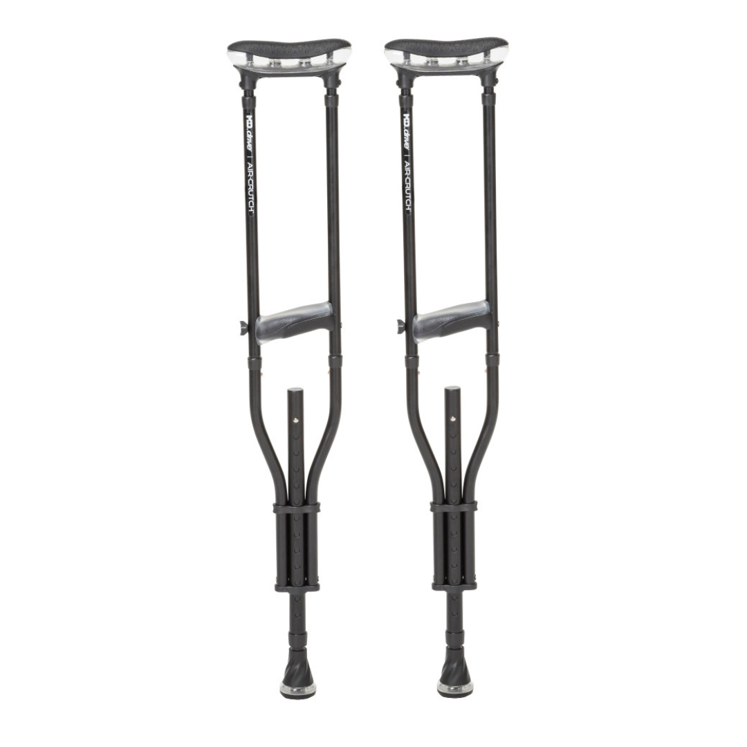 A pair of Drive Air-Crutches with Airgonomic™ Underarm Cushions in black, featuring padded underarm cushions and hand grips, stand upright side by side against a white background.