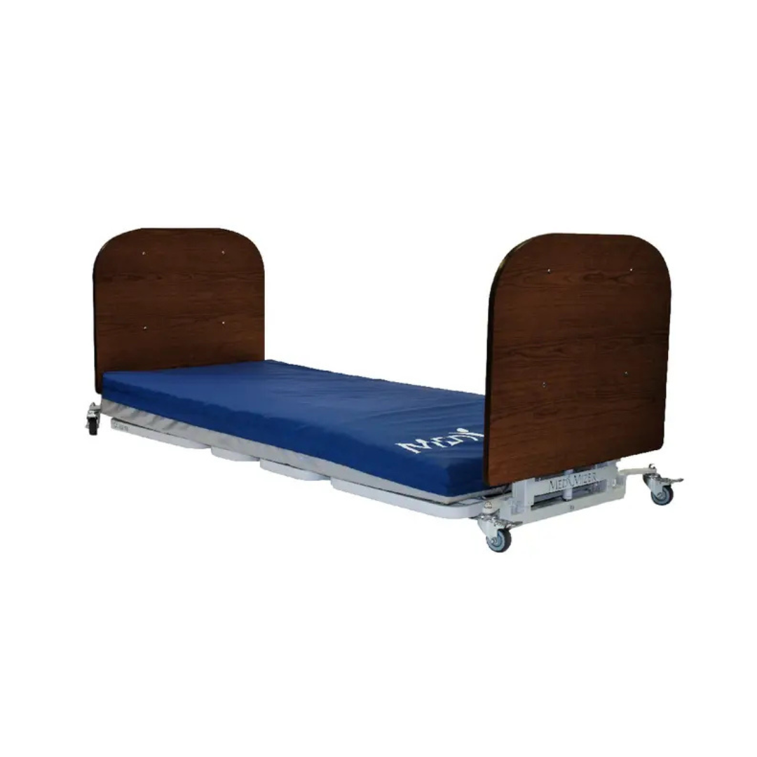 The Med-Mizer AllCare Full Electric Hi/Low Bed - Expandable Width is shown with a blue mattress, wooden headboard and footboard, and a sturdy metal frame with wheels at each corner against a white background.