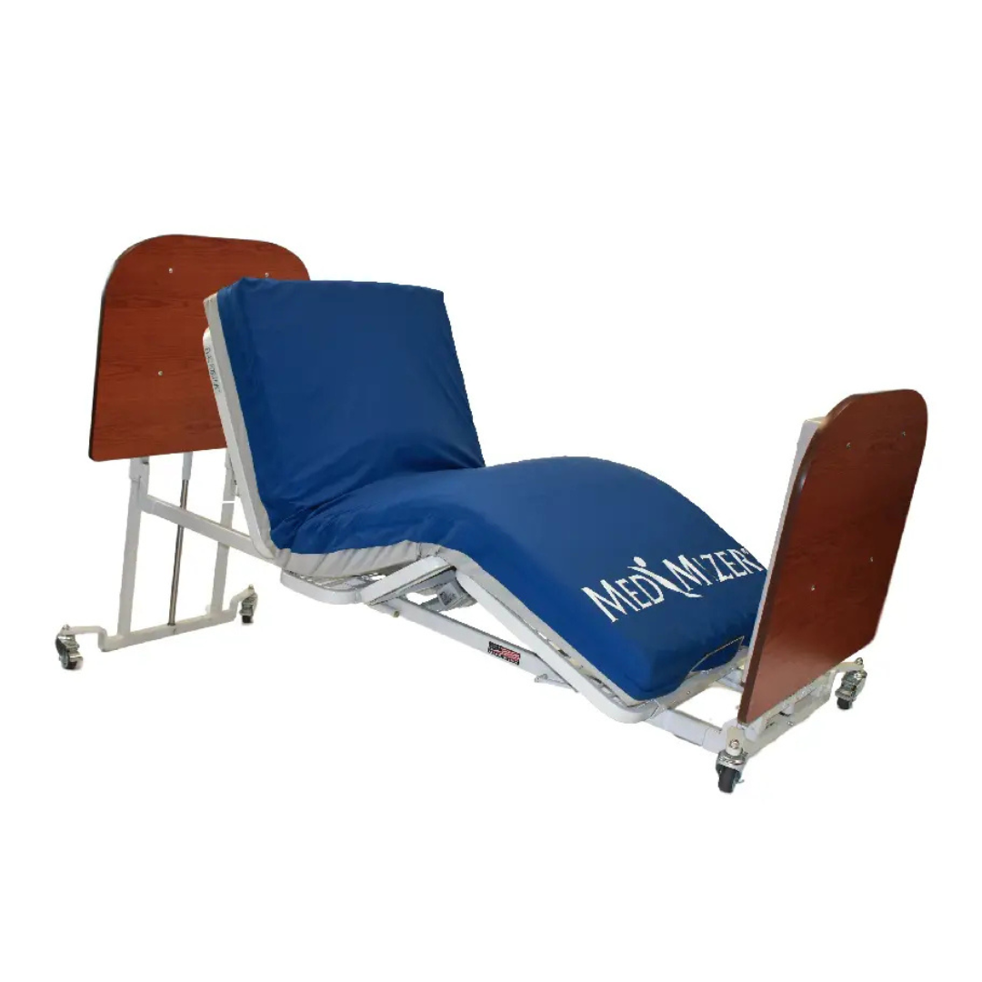 A Med-Mizer AllCare Full Electric Hi/Low Bed - Expandable Width is shown with its backrest and leg sections raised. The blue mattress cover reads MED MIZER, and the hospital bed is equipped with wheels for easy mobility.