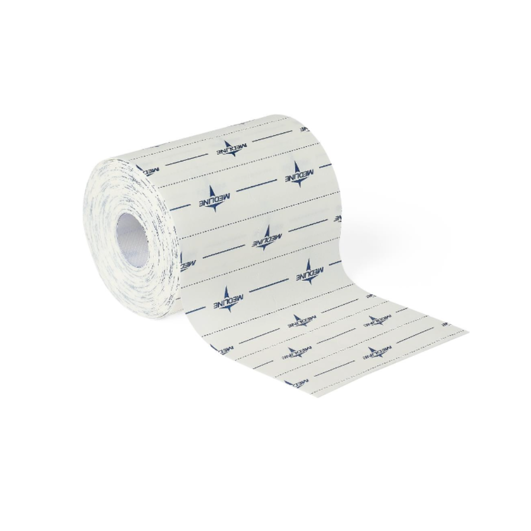 A roll of Medline MedFix Dressing Retention Tape is unspooled, showing blue text and logos next to dotted lines for easy tearing. The medical tape rests on a plain white background.