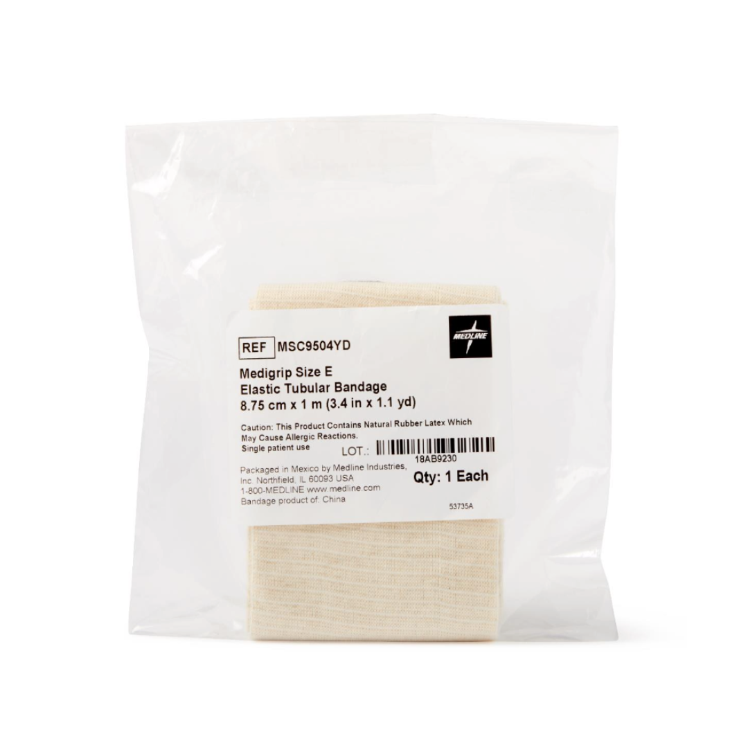 A sealed plastic pack contains a Medline Medigrip Elastic Latex Tubular Support Bandage. The white label lists product details, size (8.75 cm x 1 m), and quantity (1 each). The beige bandage is partially visible inside.