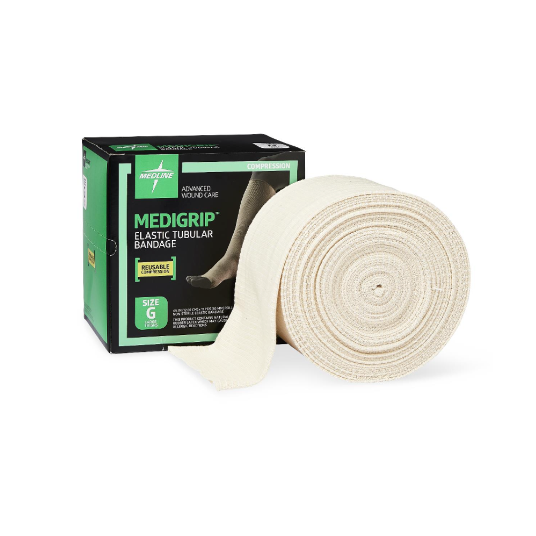 A box labeled Medline Medigrip Elastic Latex Tubular Support Bandages stands beside a large, partially unrolled roll of beige elastic bandage. The box displays a supported leg and notes the reusable product is size G.