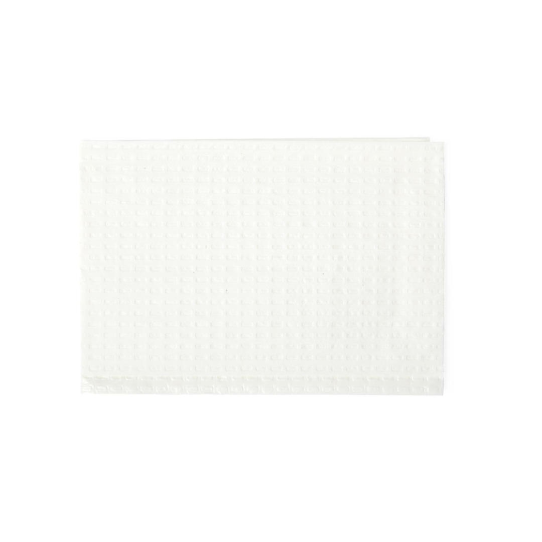 A white, rectangular Medline 2-Ply Tissue/Poly Professional Towel with a textured dimpled surface lies flat on a plain white background.