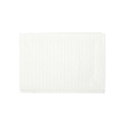 A white, rectangular Medline 2-Ply Tissue/Poly Professional Towel with a textured dimpled surface lies flat on a plain white background.