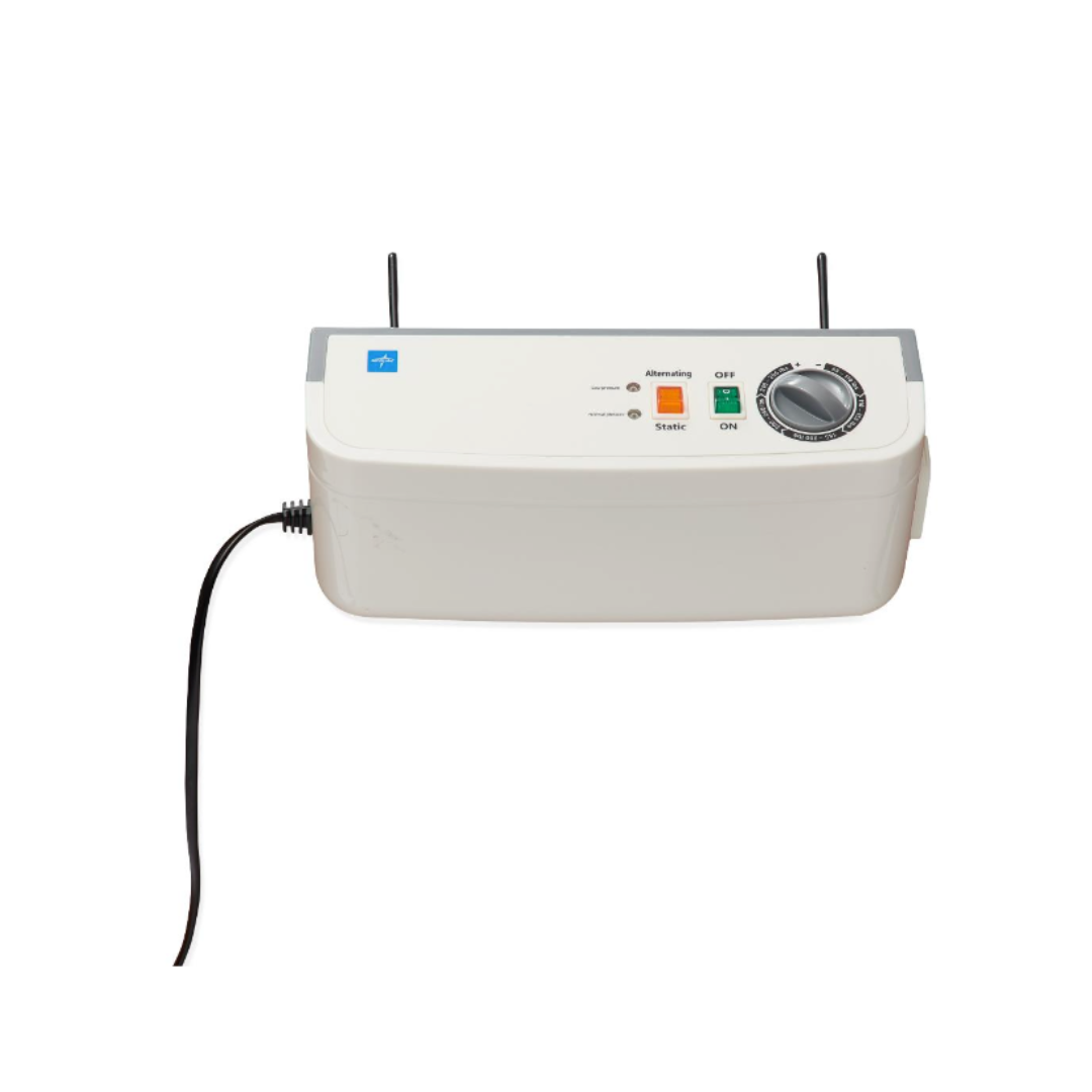 The Medline A10 LAL Alternating Pressure Mattress System is a white electronic device with indicator lights, Ready/Static/ON buttons, a right-side dial, antenna, and power cord—designed for pressure injury prevention.