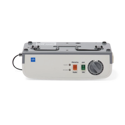 The Medline A10 LAL Alternating Pressure Mattress System is a rectangular device with a power cord, control buttons, on/off switch, dial, indicator lights, and labeled settings for Alternating and Static to help prevent pressure injuries.