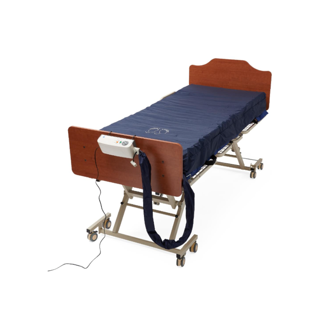 The Medline A10 LAL Alternating Pressure Mattress System features wooden head/footboards, a blue low air-loss mattress for pressure injury prevention, an attached control unit, and wheeled legs, isolated on a white background.