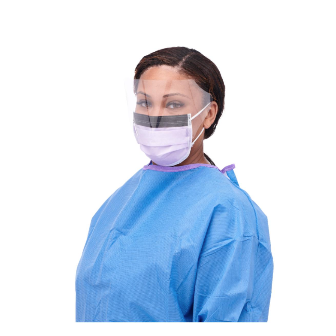 A woman in a blue medical gown wears the Medline ASTM L3 Procedure Face Mask with Eye Shield and Ear Loops and a clear face shield, looking at the camera against a white background.