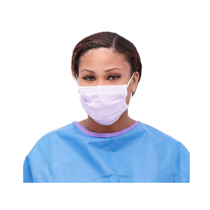 A person wearing a blue medical gown and a Medline ASTM Level 3 Procedure Face Mask with ear loops, looking forward against a white background.