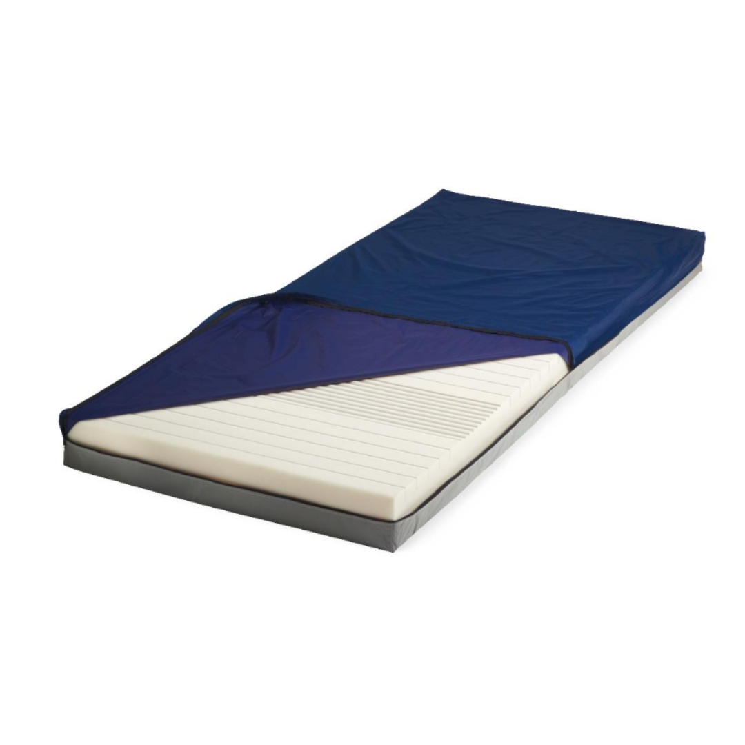 The Medline Advantage 200 5-Zone Homecare Mattress features a white, textured foam surface with therapeutic zones for comfort and pressure redistribution, shown with its blue protective cover partially pulled back on a plain white background.