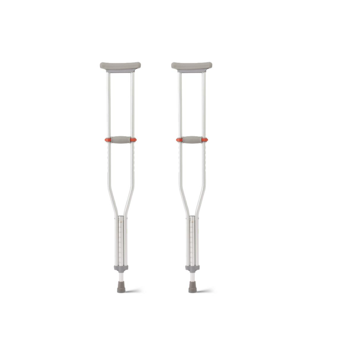 Medline Aluminum Crutches with Red Dot Hand Grip feature gray underarm pads and rubber tips, plus push-button height adjustment. They stand upright on a white background.