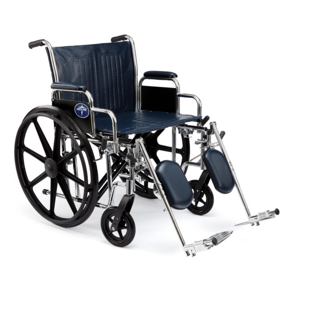 The Medline Bariatric Extra-Wide Wheelchair has large black rear wheels, smaller front wheels, a navy vinyl padded seat and backrest, armrests, adjustable footrests, and a durable carbon steel frame with a logo tag on the side.