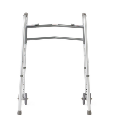 The Medline Bariatric Folding Walker with XL Wheels is a silver, adjustable walker for mobility assistance. It has two front wheels, rubber grips, and a sturdy extra-wide frame for high weight capacity. Photographed against a plain white background.
